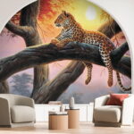Fototapety Leopard ležiaci na strome pri západe slnka.