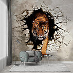 Fototapety Tiger vychádzajúci cez prasknutú stenu
